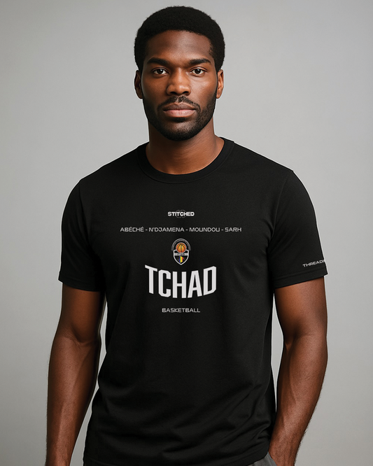 Man wearing black STITCHED TCHAD basketball t-shirt with federation crest and city names. African basketball streetwear from Chad.