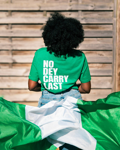 Green t-shirt with Nigerian flag in motion, celebrating African basketball culture