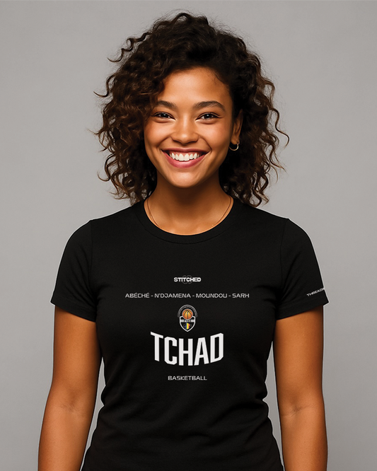 Woman wearing black STITCHED TCHAD basketball t-shirt with federation crest and city names. African basketball streetwear from Chad.